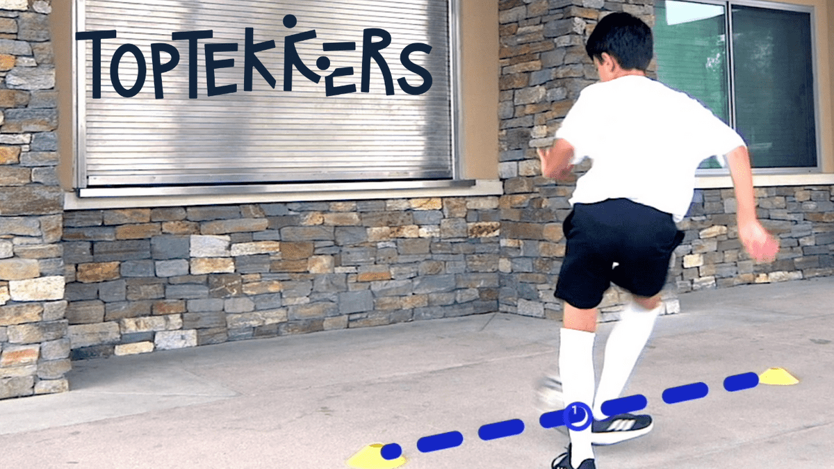 child works on his football techniques with TopTekkers markers shown
